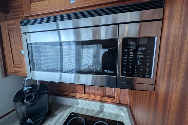 Slide: The Image of Stainless steel microwave and Keurig in 2015 American Tug 435 kitchen. - 40