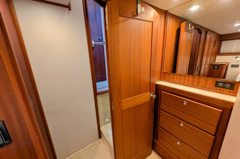 Slide: The Image of Interior of 2015 American Tug 435 with wooden cabinetry and drawers. - 66