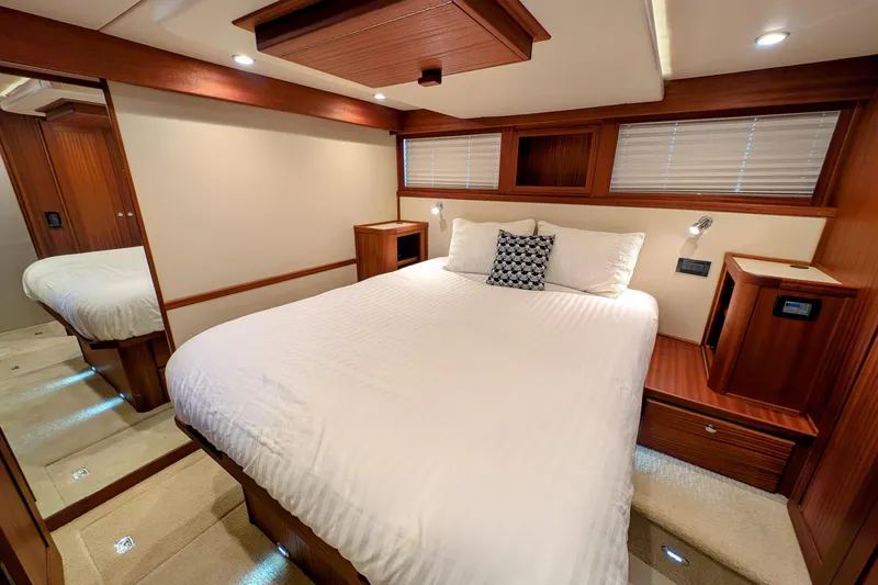 Slide: The Image of Luxurious bedroom interior of 2015 American Tug 435 with elegant wood finishes. - 71