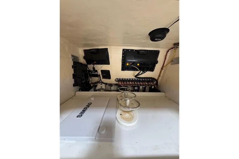Slide: The Image of 2018 Calcutta catamaran interior with Simrad electronics and wiring setup. - 11