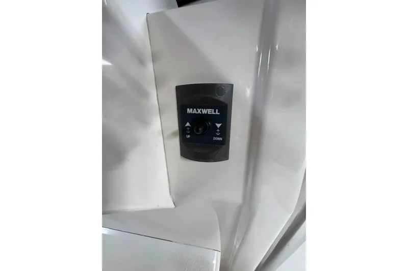 Slide: The Image of Control panel on a 2018 Calcutta catamaran, featuring Maxwell anchor controls. - 18