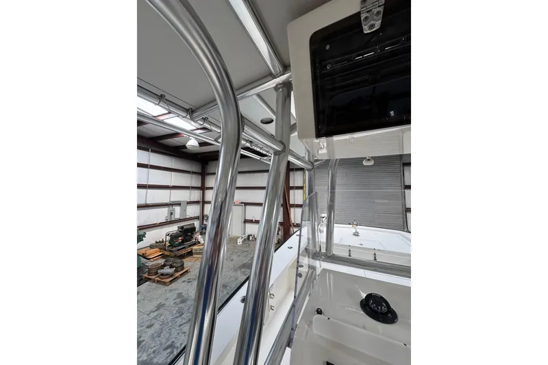 Slide: The Image of 2018 Calcutta catamaran in warehouse, showcasing sleek design and metallic framework. - 20