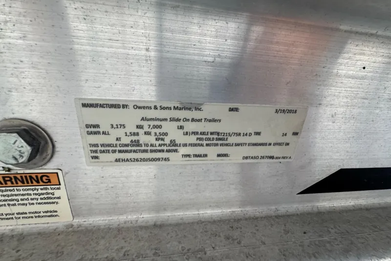 Slide: The Image of Label on Calcutta catamaran trailer, manufactured by Owens & Sons Marine, dated 3/19/2018. - 21
