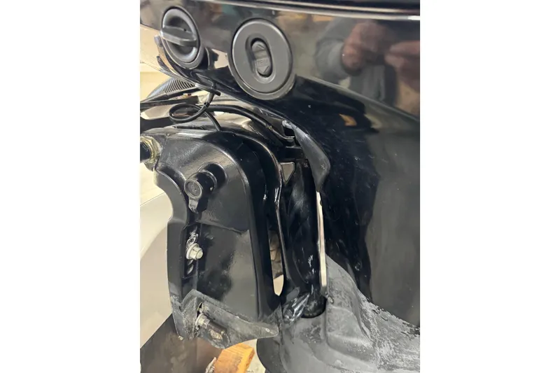 Slide: The Image of Close-up of a 2018 Calcutta catamaran engine component, showcasing mechanical details. - 22