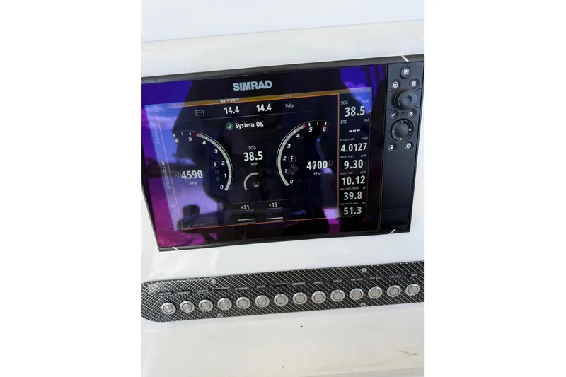 Slide: The Image of Simrad display on 2018 Calcutta catamaran showing speed and system status. - 28