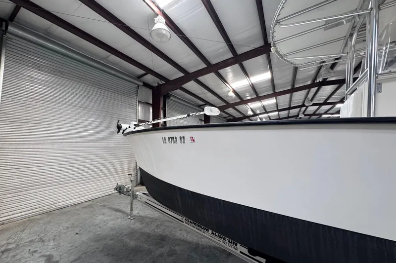 Slide: The Image of 2018 Calcutta catamaran in storage, showcasing sleek design and modern features. - 4