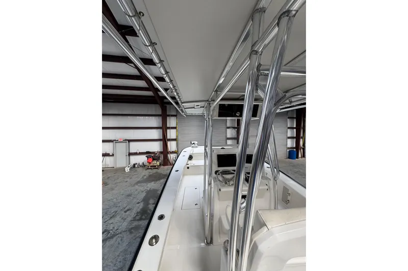 Slide: The Image of 2018 Calcutta catamaran interior view in storage facility, showcasing sleek design and structure. - 7