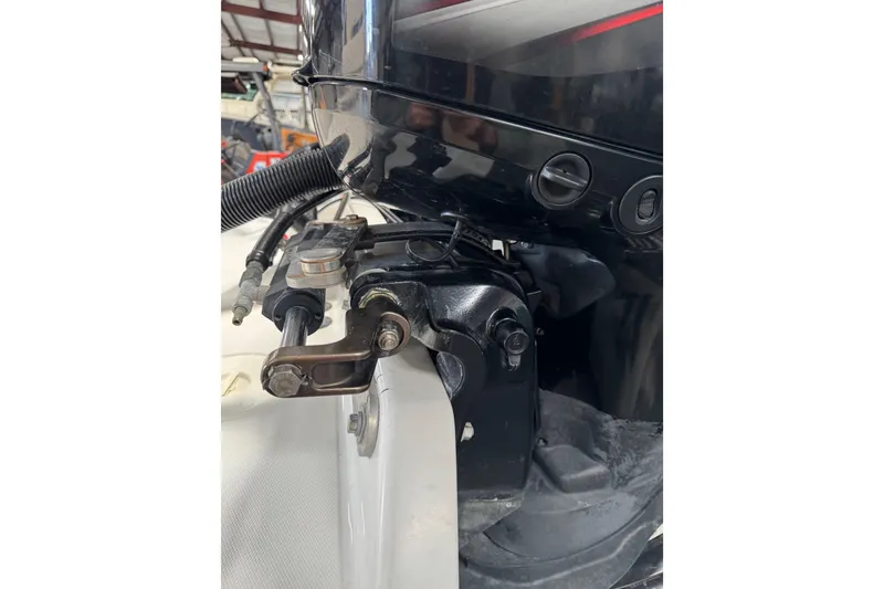 Slide: The Image of Close-up of a 2018 Calcutta catamaran engine component in a workshop setting. - 9