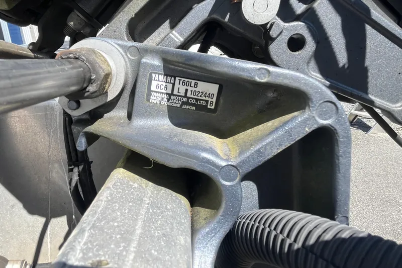 Slide: The Image of Close-up of Yamaha T60LB motor on 2014 Bennington 22SSX boat. - 3