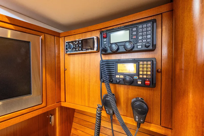 Slide: The Image of Wooden yacht interior with communication equipment, Ron Holland 50, 2013 model. - 26