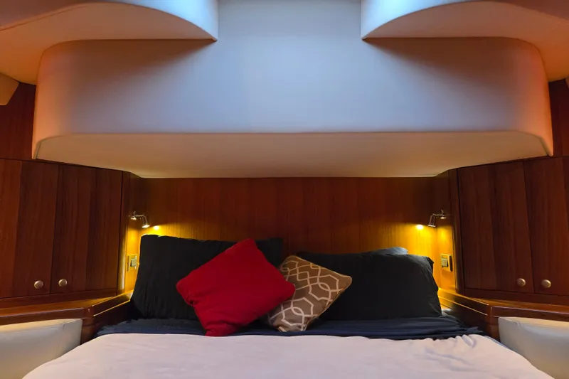 Slide: The Image of Luxurious cabin interior of 2013 Ron Holland 50 yacht with cozy bedding and ambient lighting. - 35