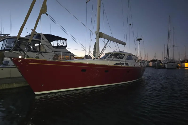 Slide: The Image of Red Ron Holland 50 yacht docked at sunset, 2013 model. - 48