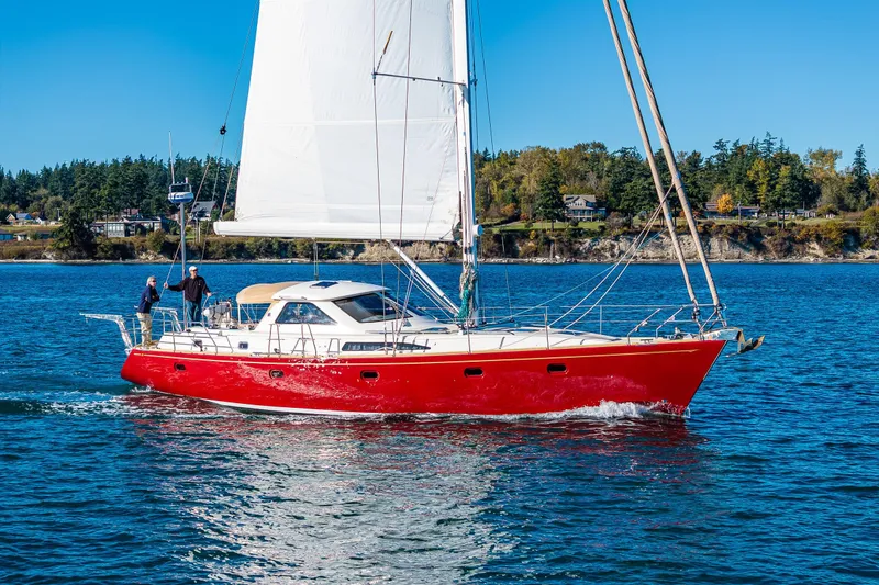 Slide: The Image of Red Ron Holland 50 sailboat from 2013 sailing on a sunny day. - 7