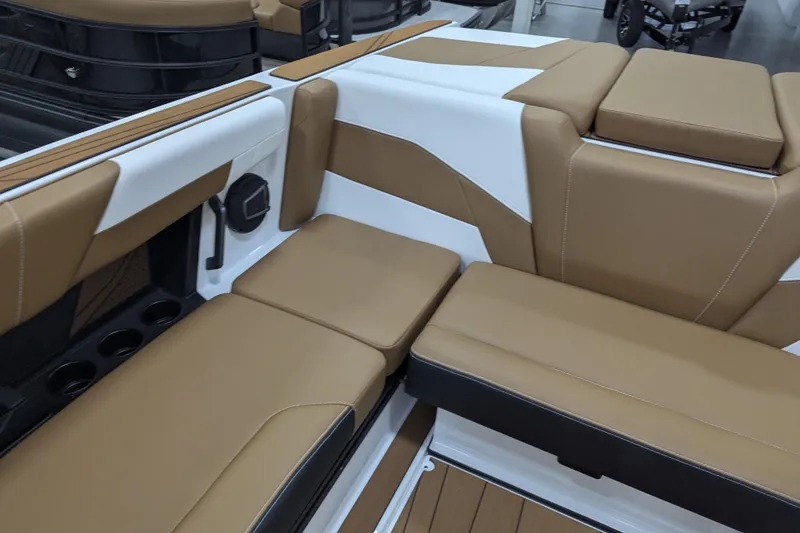 Slide: The Image of 2026 Axis T250 boat interior with brown and white seating, modern design. - 18