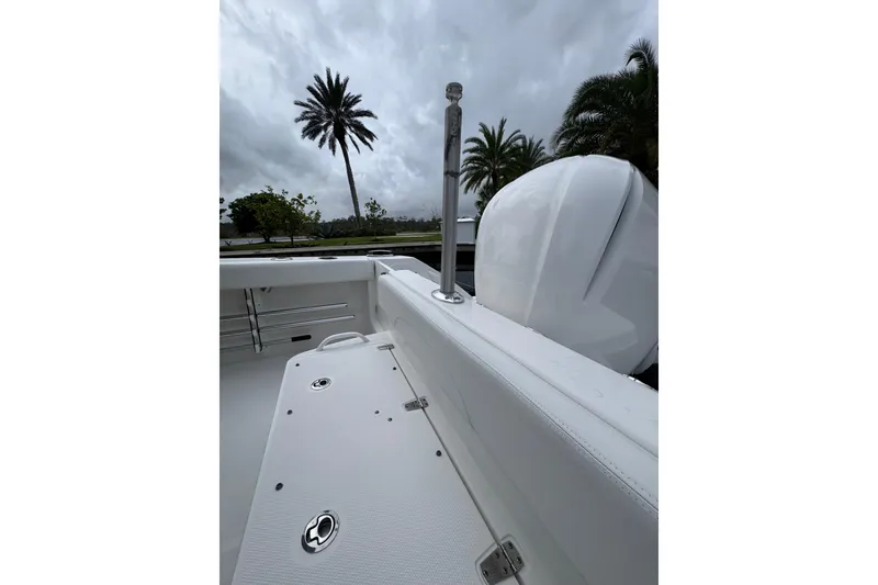 Slide: The Image of Open storage compartments on a 2019 Edgewater 230CC boat. - 18