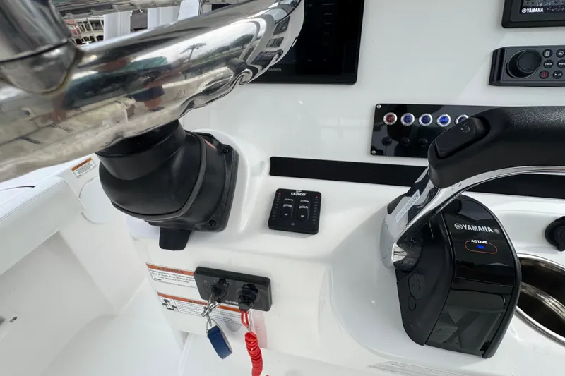 Slide: The Image of Yamaha trip display showing fuel usage and distance on 2019 Edgewater 230CC boat. - 44