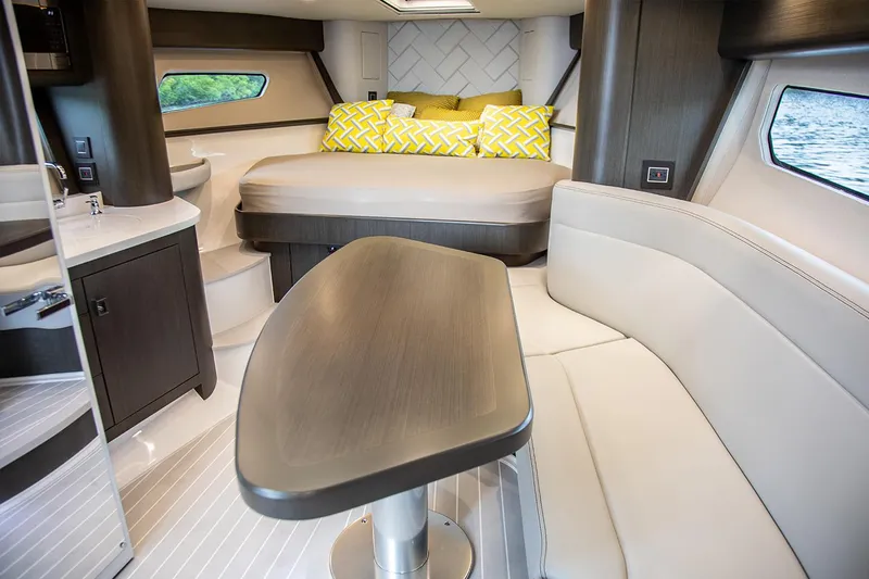 Slide: The Image of Manufacturer Provided Image: Luxurious interior of 2021 Intrepid 410 Evolution yacht with modern furnishings. - 15
