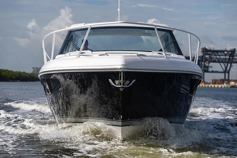 Slide: The Image of Manufacturer Provided Image: 2021 Intrepid 410 Evolution boat cruising on water. - 3