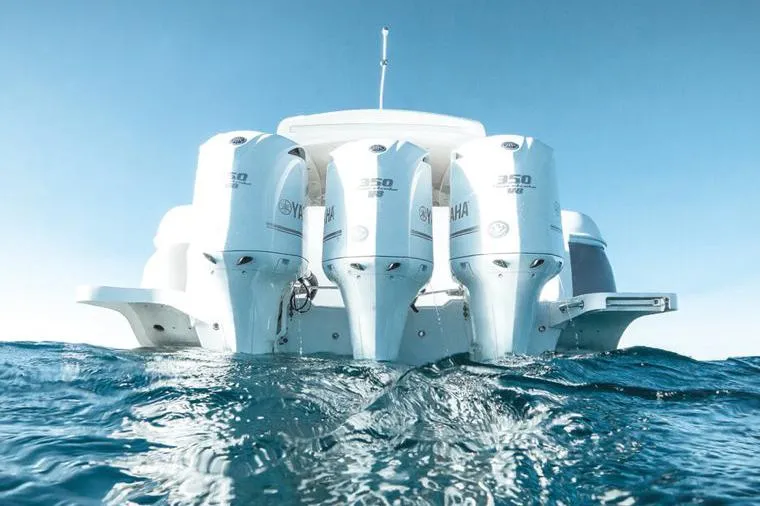 Slide: The Image of Manufacturer Provided Image: 2021 Intrepid 410 Evolution boat with Yamaha 350 engines on the ocean. - 5