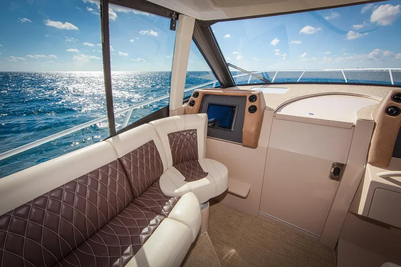 Slide: The Image of Manufacturer Provided Image: Interior of 2021 Intrepid 410 Evolution yacht with ocean view. - 9
