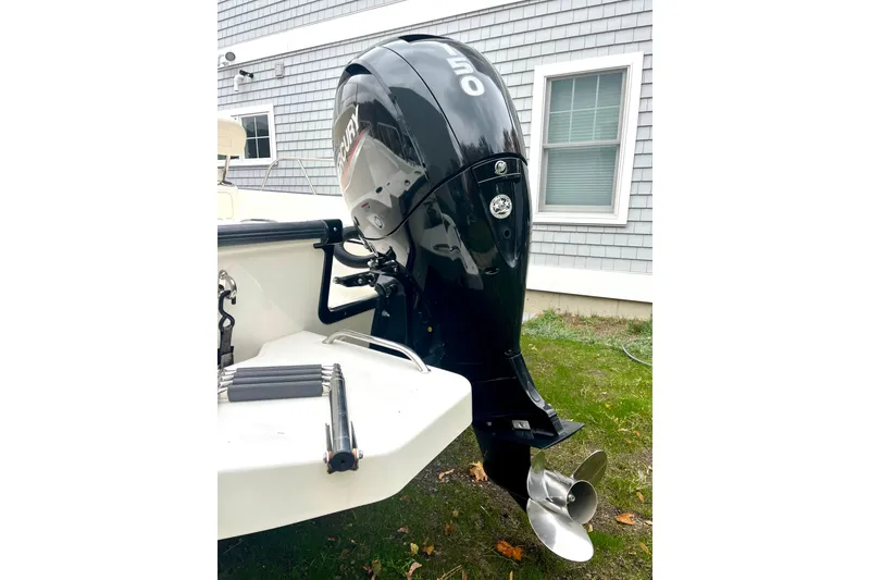 Slide: The Image of 2020 Boston Whaler 210 Montauk boat deck with open storage compartment. - 21