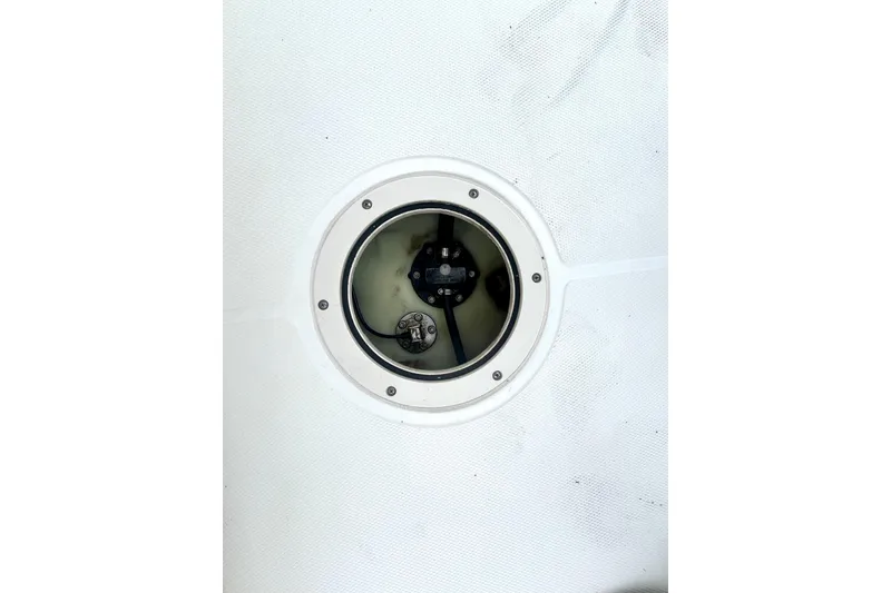 Slide: The Image of Battery compartment of a 2020 Boston Whaler 210 Montauk boat. - 28