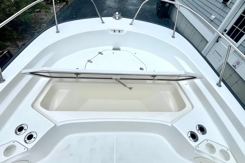 Slide: The Image of 2020 Boston Whaler 210 Montauk boat console with steering wheel and controls. - 31