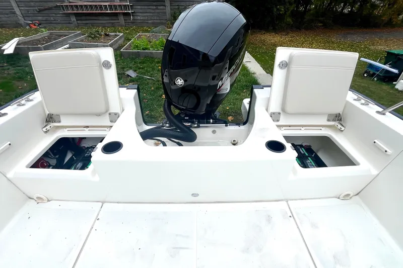 Slide: The Image of 2020 Boston Whaler 210 Montauk boat console with steering wheel and controls. - 32