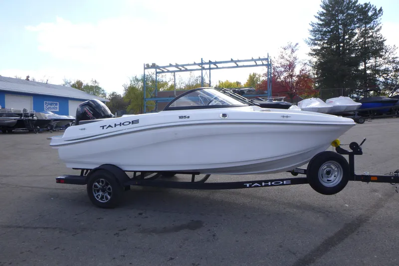 The Image of 2024 Tahoe 185 S boat on trailer in outdoor setting. - 1
