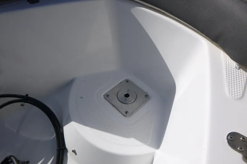 Slide: The Image of 2024 Tahoe 185 S boat interior detail with seating and deck features. - 4