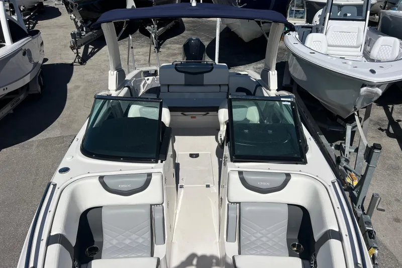 Slide: The Image of 2023 Chaparral 270 OSX boat with sleek design and spacious seating. - 20
