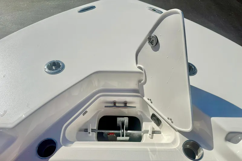 Slide: The Image of 2026 Key West 244 Center Console boat interior with cushioned seating and modern design. - 16