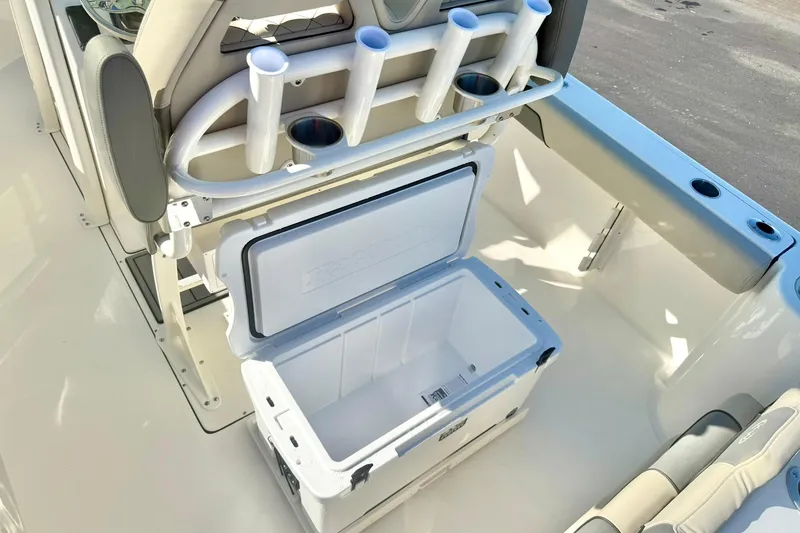 Slide: The Image of 2026 Key West 244 Center Console boat interior with steering wheel and control panel. - 30