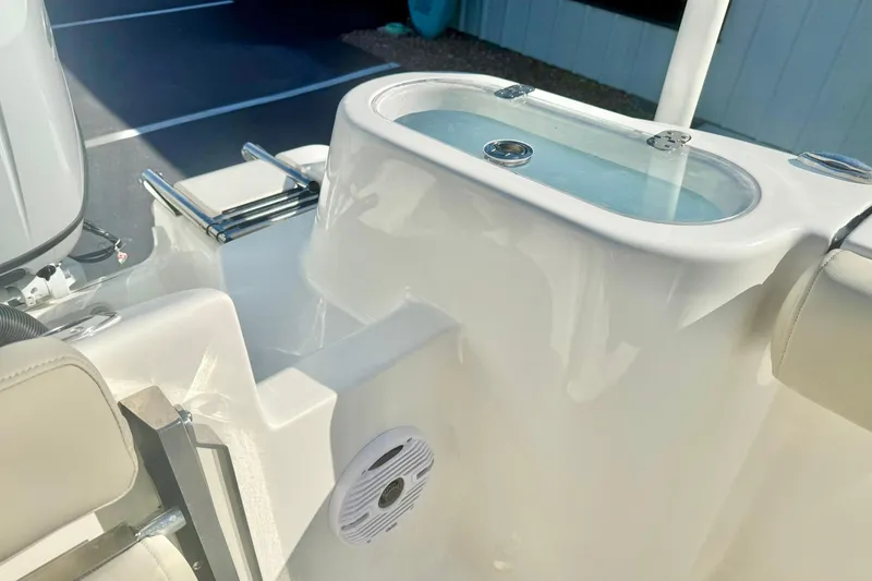 Slide: The Image of 2026 Key West 244 Center Console boat interior with livewell and seating. - 51