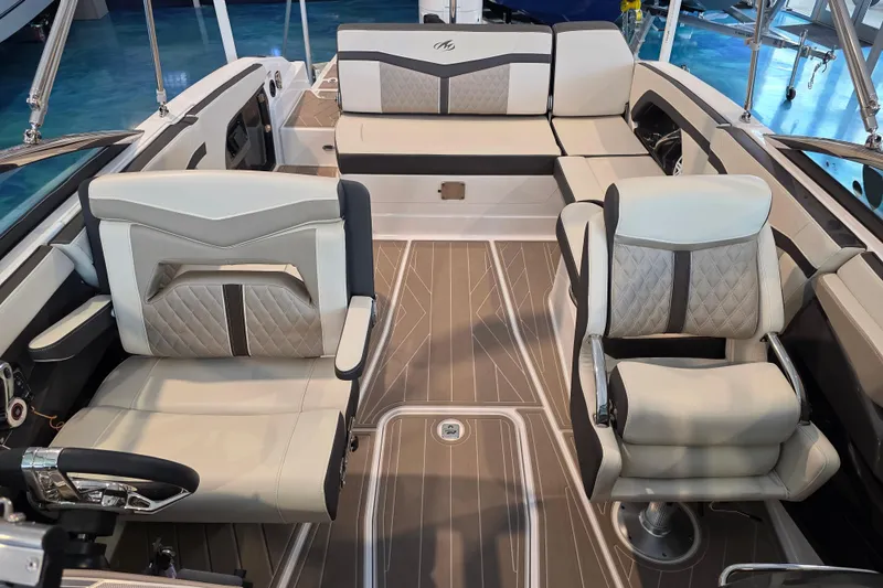 Slide: The Image of 2024 Monterey 275SS Super Sport boat interior with luxurious seating and modern design. - 16