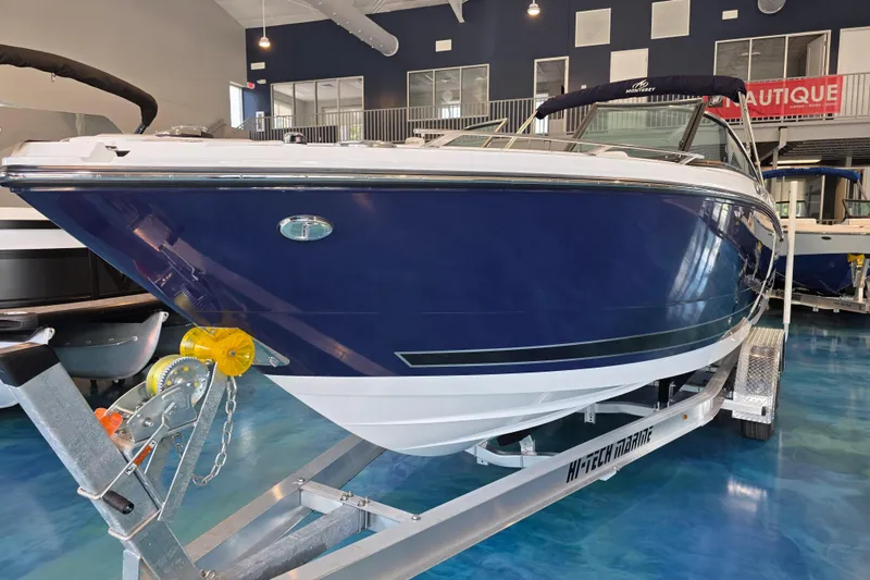 Slide: The Image of 2024 Monterey 275SS Super Sport boat on trailer in showroom. - 3