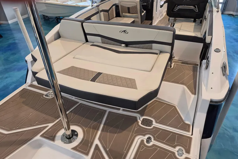 Slide: The Image of 2024 Monterey 275SS Super Sport boat interior with luxurious seating and stylish flooring. - 7