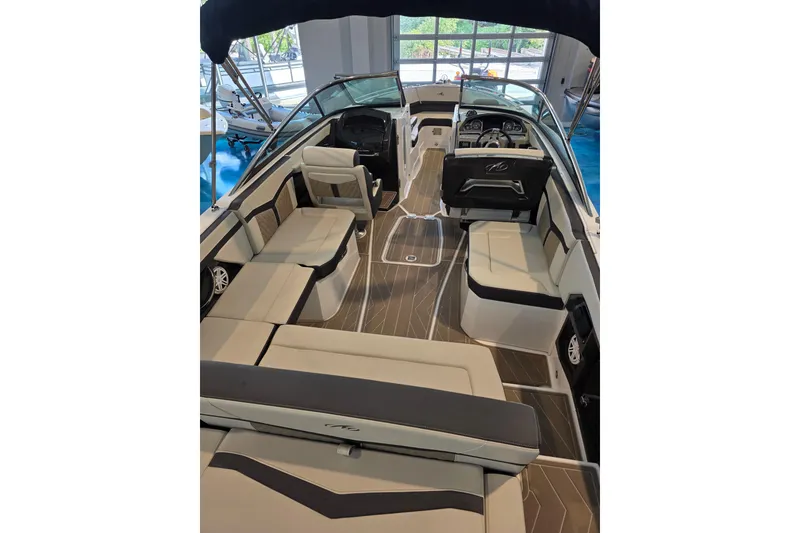 Slide: The Image of 2024 Monterey 275SS Super Sport boat interior with luxurious seating and modern dashboard. - 9