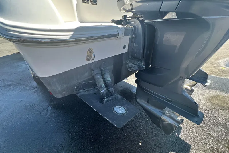 Slide: The Image of 2009 Scarab Sport 30 boat stern with outboard motor detail. - 13