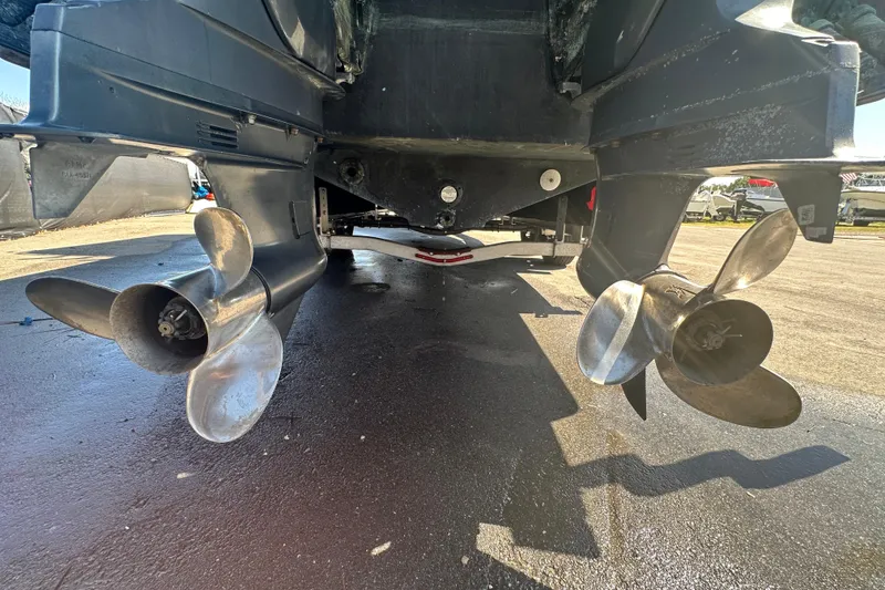 Slide: The Image of Rear view of 2009 Scarab Sport 30 boat propellers on a sunny day. - 15