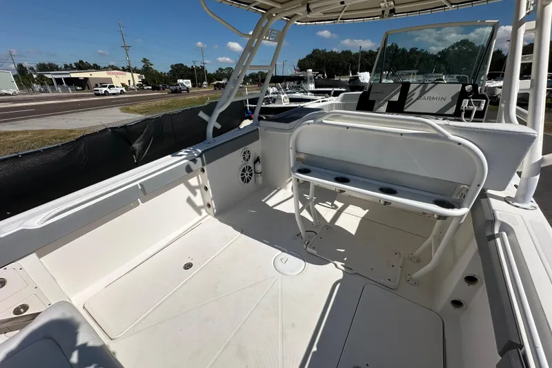 Slide: The Image of 2009 Scarab Sport 30 boat interior with seating and Garmin navigation system. - 22
