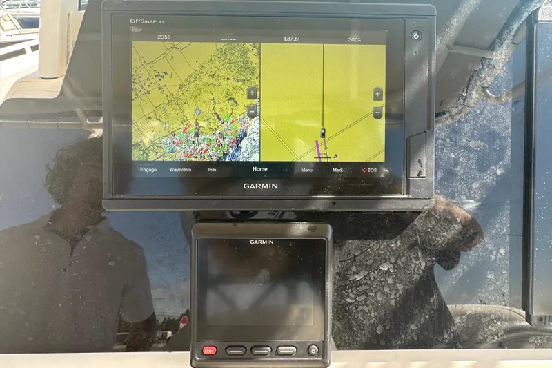 Slide: The Image of Garmin GPS display on 2009 Scarab Sport 30 boat dashboard. - 29