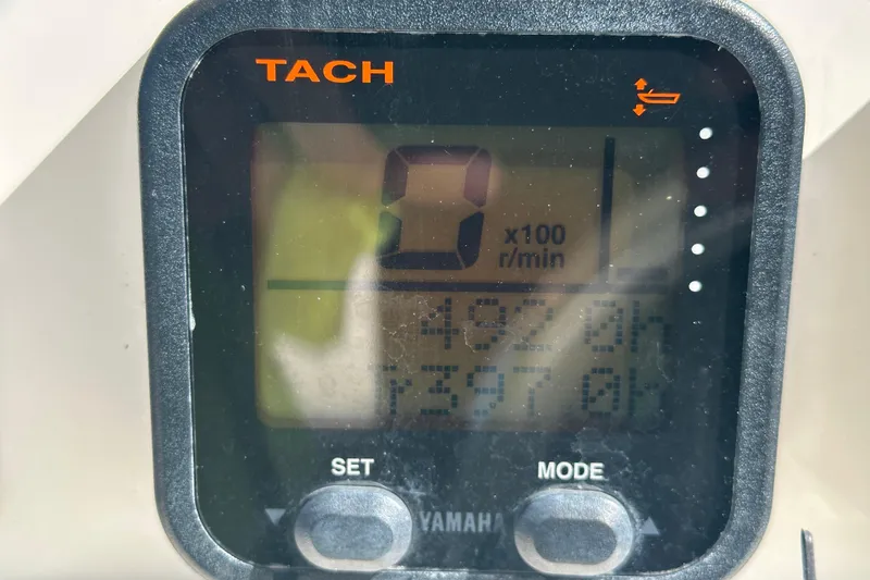 Slide: The Image of Tachometer display on 2009 Scarab Sport 30, showing 0 RPM and engine hours. - 34