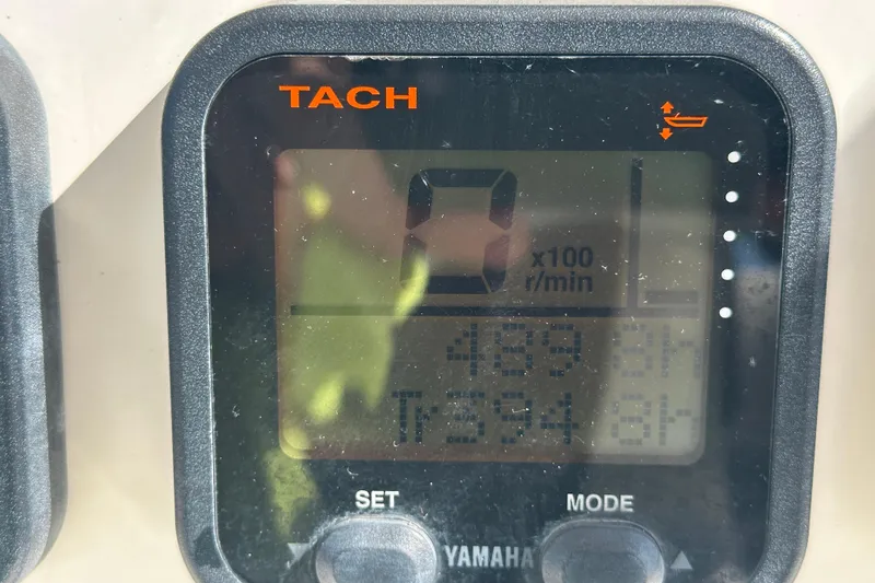 Slide: The Image of Tachometer display on a 2009 Scarab Sport 30, showing engine hours and RPM. - 35