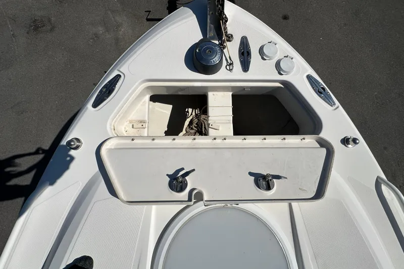 Slide: The Image of Bow of 2009 Scarab Sport 30 boat with anchor storage and deck fittings. - 55