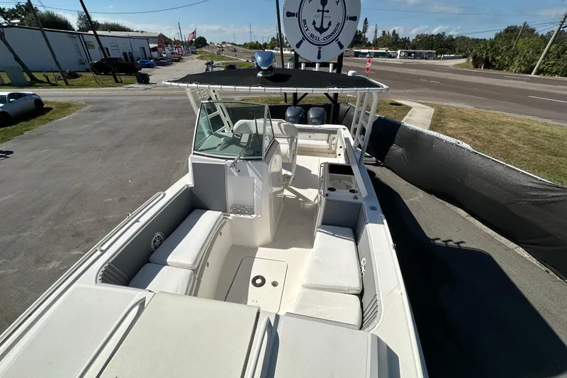 Slide: The Image of 2009 Scarab Sport 30 boat with spacious seating and modern design. - 57