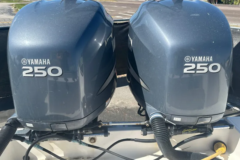 Slide: The Image of Twin Yamaha 250 outboard engines on a 2009 Scarab Sport 30 boat. - 76