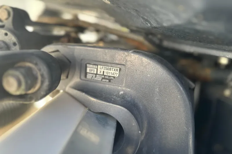 Slide: The Image of Close-up of Yamaha F250B engine part on 2009 Scarab Sport 30 boat. - 79