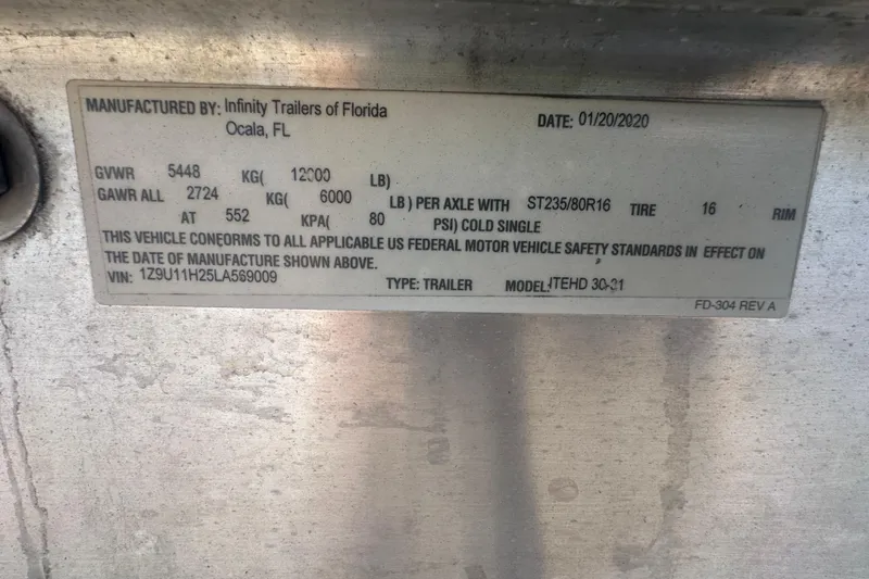 Slide: The Image of Close-up of a Yamaha LF250B engine part on a 2009 Scarab Sport 30 boat. - 80