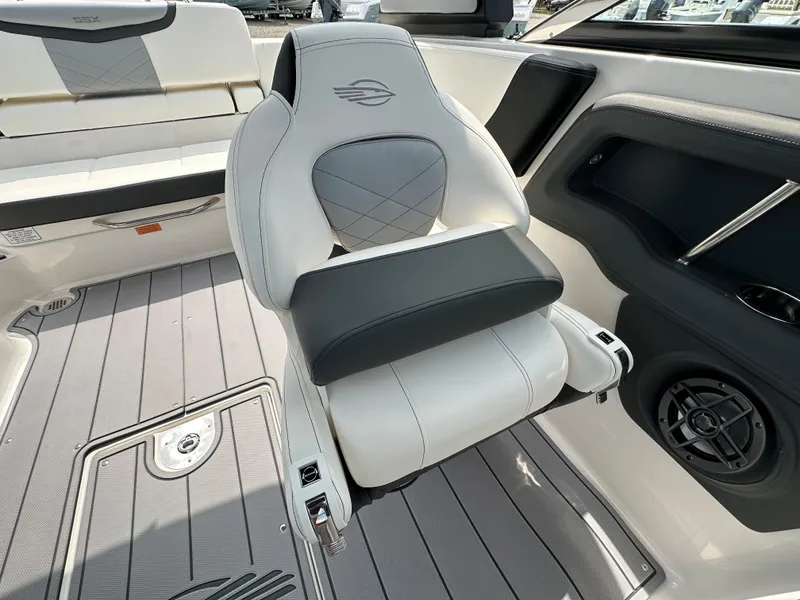 Slide: The Image of 2023 Chaparral 270 OSX boat interior with luxurious seating and modern design. - 40